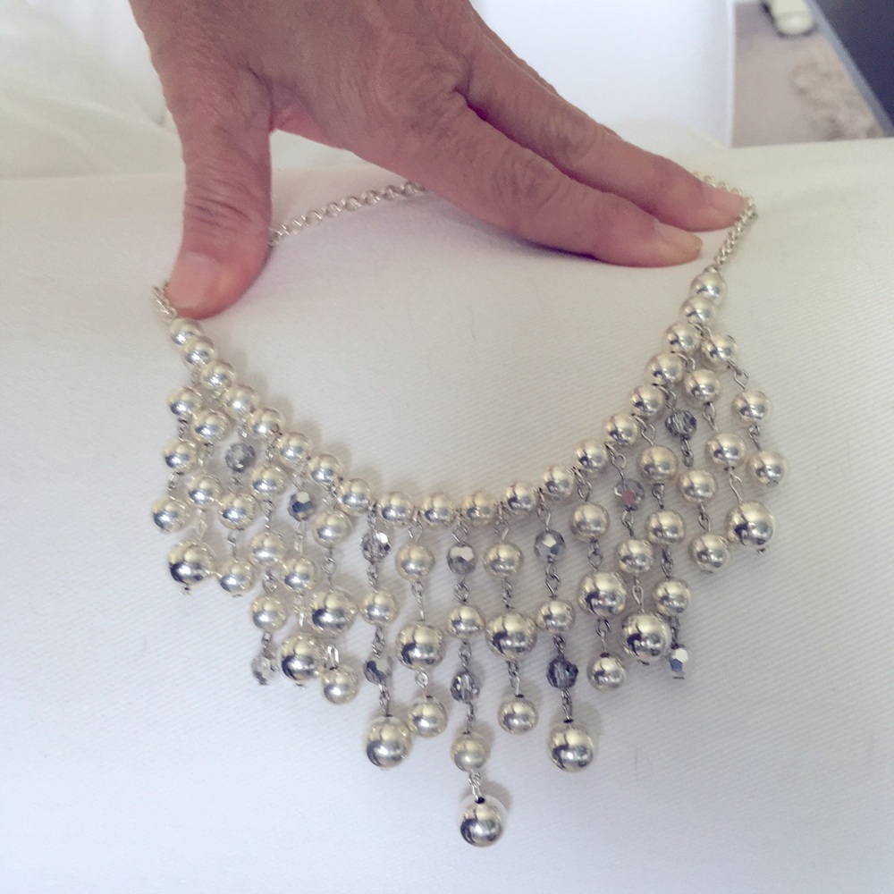 Silver beaded necklace and earrings. Costume jewelry   16” necklace.